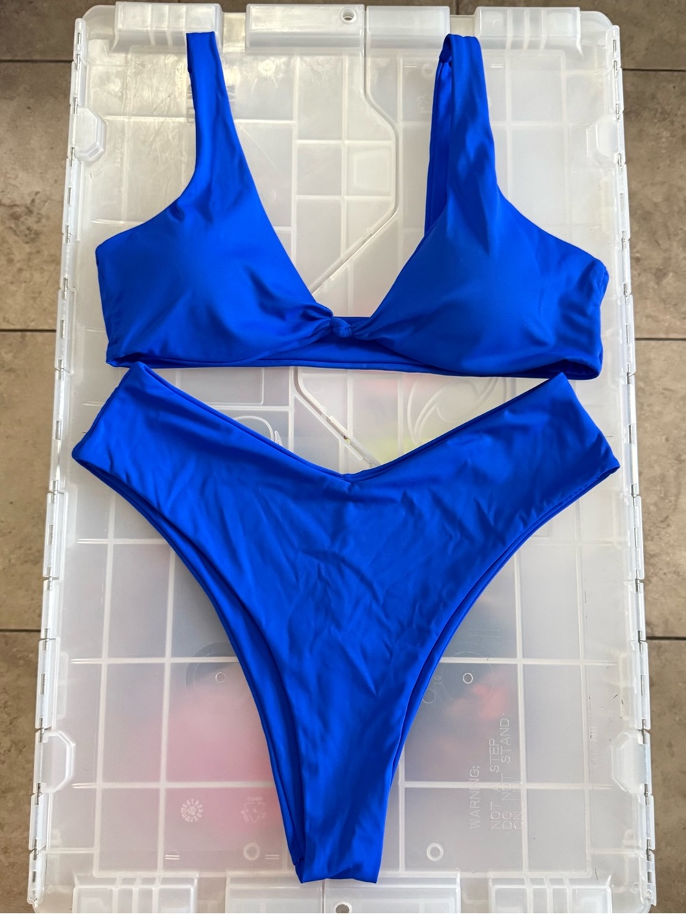 Cheeky blue bikini with knot-front detail